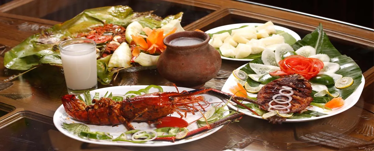 Explore Authentic Kerala Cuisine on a Houseboat –      A Journey of Flavors on the Backwaters